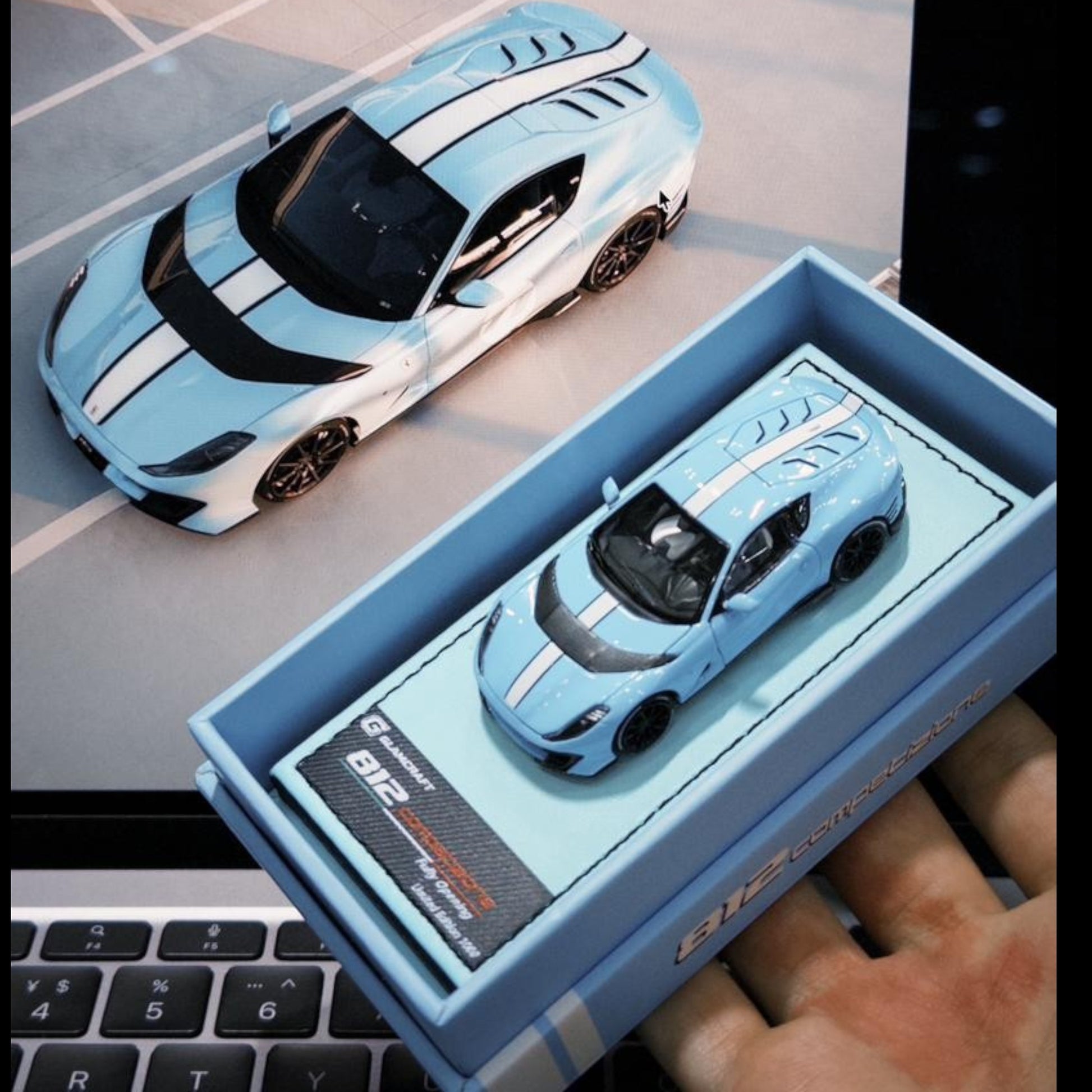 Lot57Supplies Diecast Shop GLAMCRAFT 1:64 scale light blue Ferrari 812 Competizione diecast model car in display box
