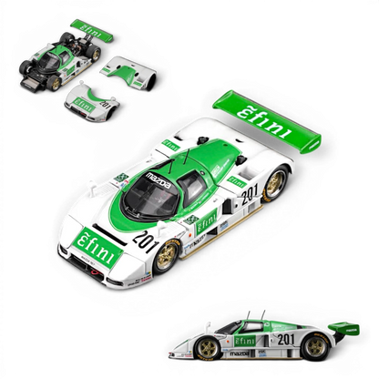 Lot57Supplies Diecast Shop 1:64 scale diecast Mazda 787B race car in green and white with Efini livery and gold wheels.