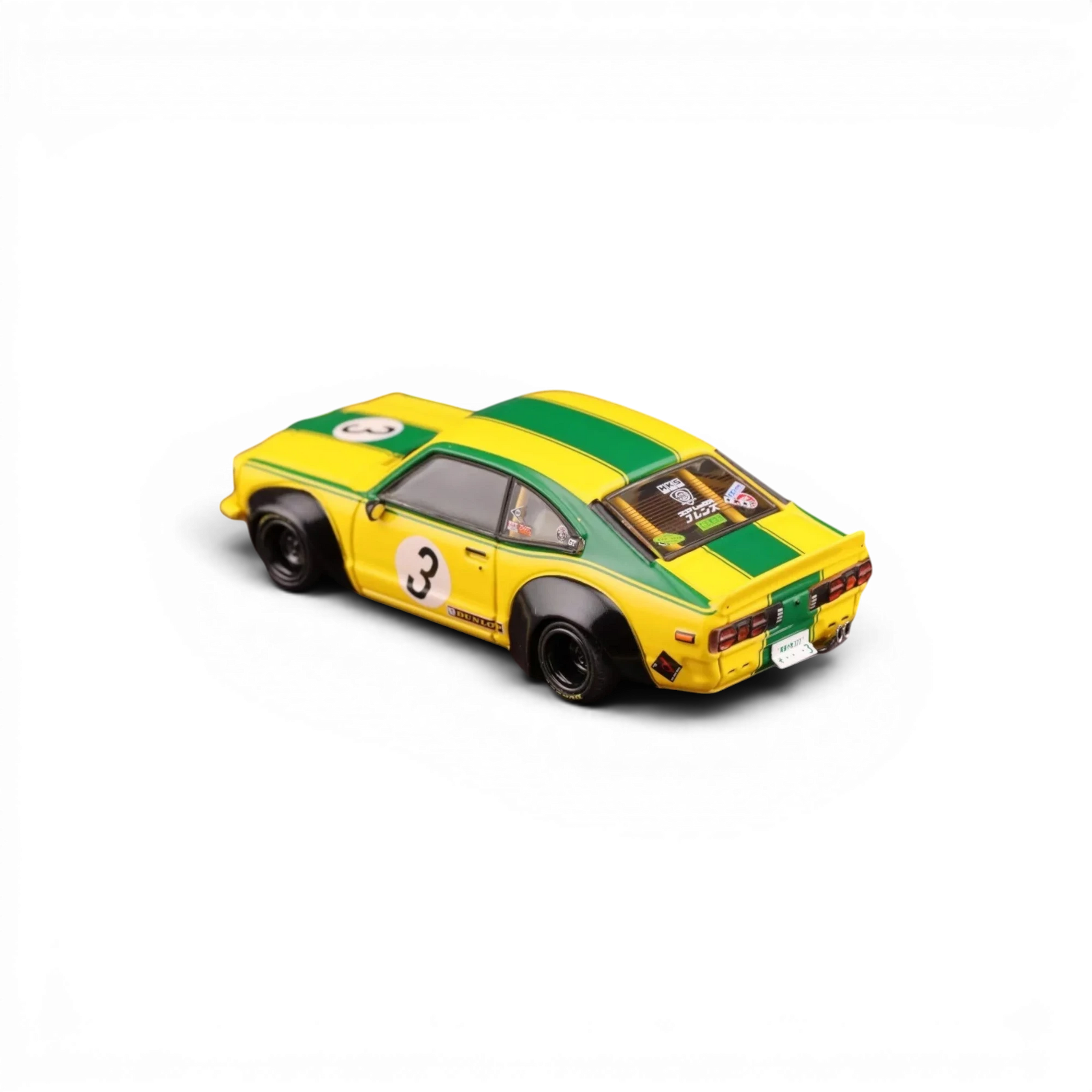 Lot57Supplies Diecast Shop Inno64 Mazda RX-3 Savanna LBWK diecast model car in yellow and green with racing livery