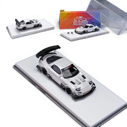 Lot57Supplies Diecast Shop Pearl White Mazda RX-7 FD 1:64 scale model with custom details and large rear spoiler.