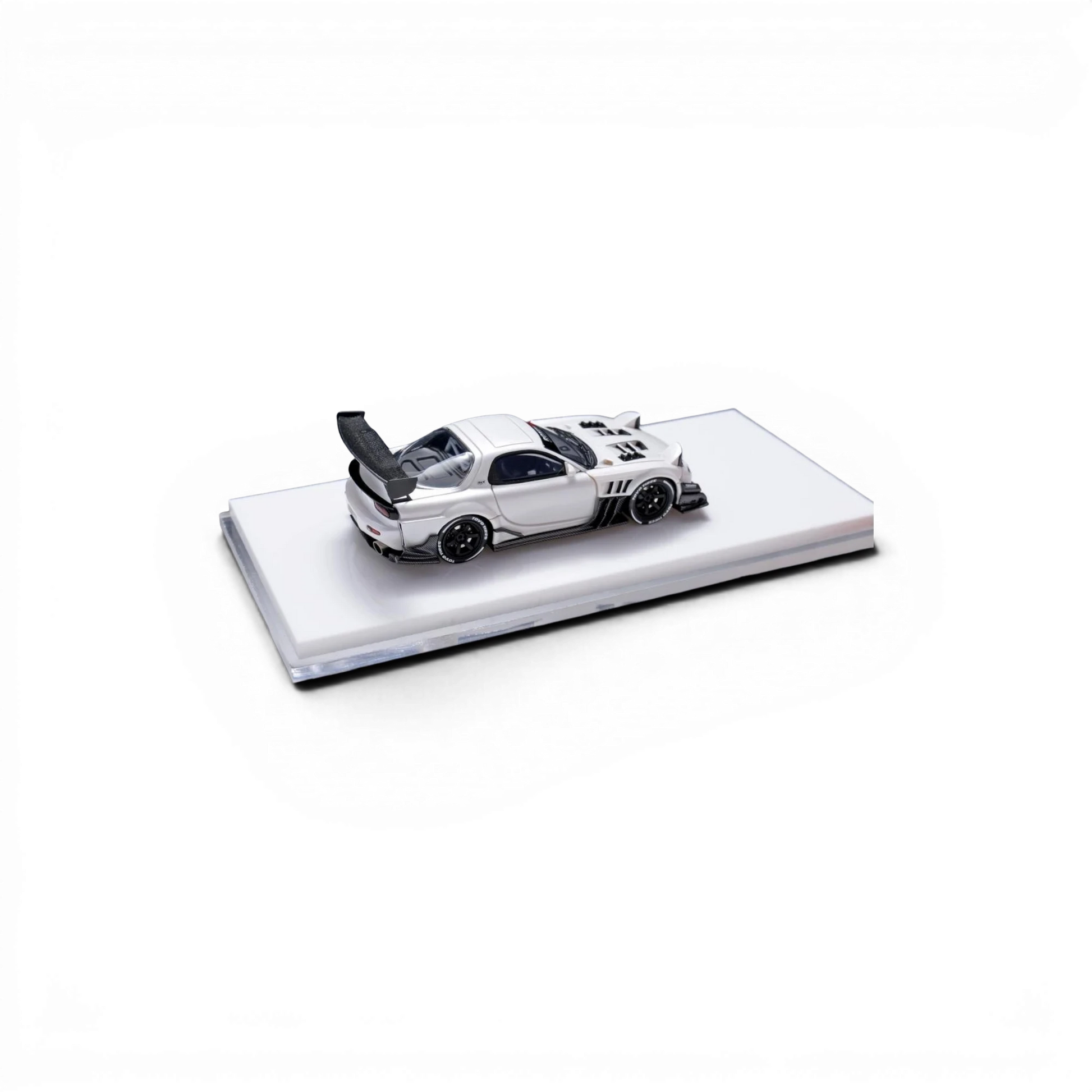 Lot57Supplies Diecast Shop 1:64 scale pearl white custom Mazda RX-7 FD resin model car with large rear spoiler and custom body kit.
