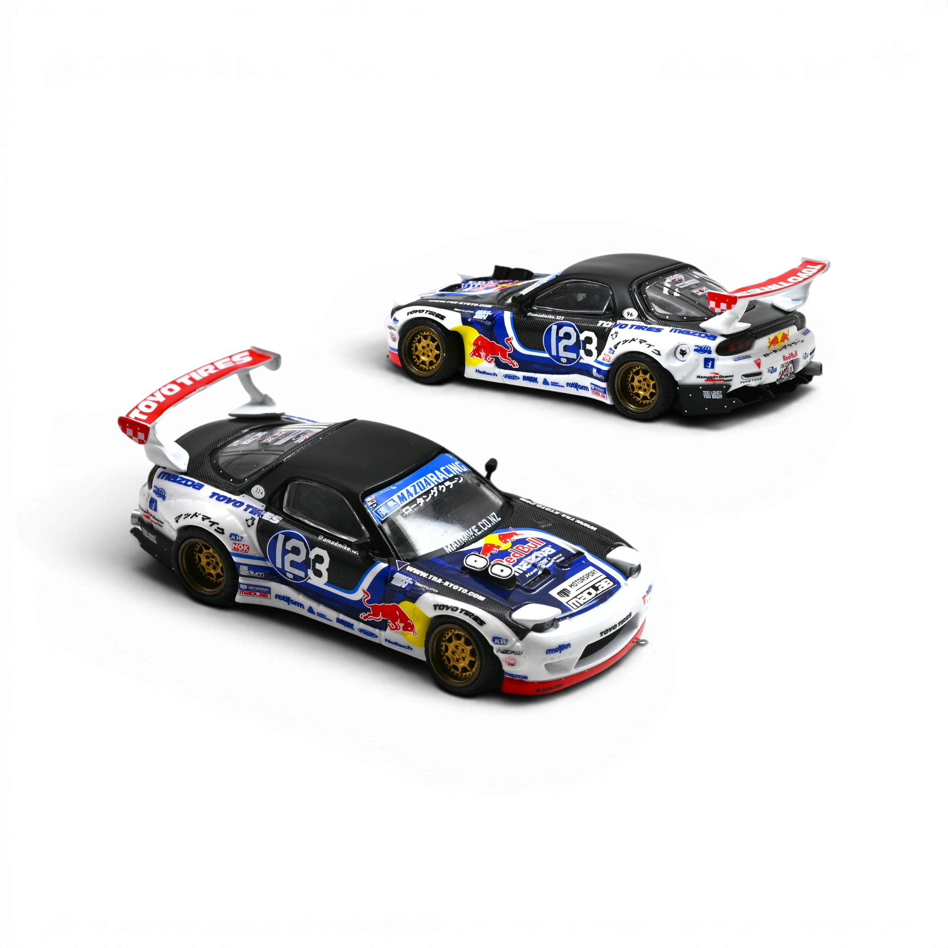 Lot57Supplies Diecast Shop 1:64 scale Inno64 Mazda RX-7 Mad Mike MADBUL Gen8 diecast drift car with racing livery.