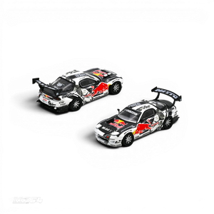 Lot57Supplies Diecast Shop 1:64 scale Inno64 Mazda RX-7 Mad Mike MADBUL Gen6 diecast model car with Red Bull livery.