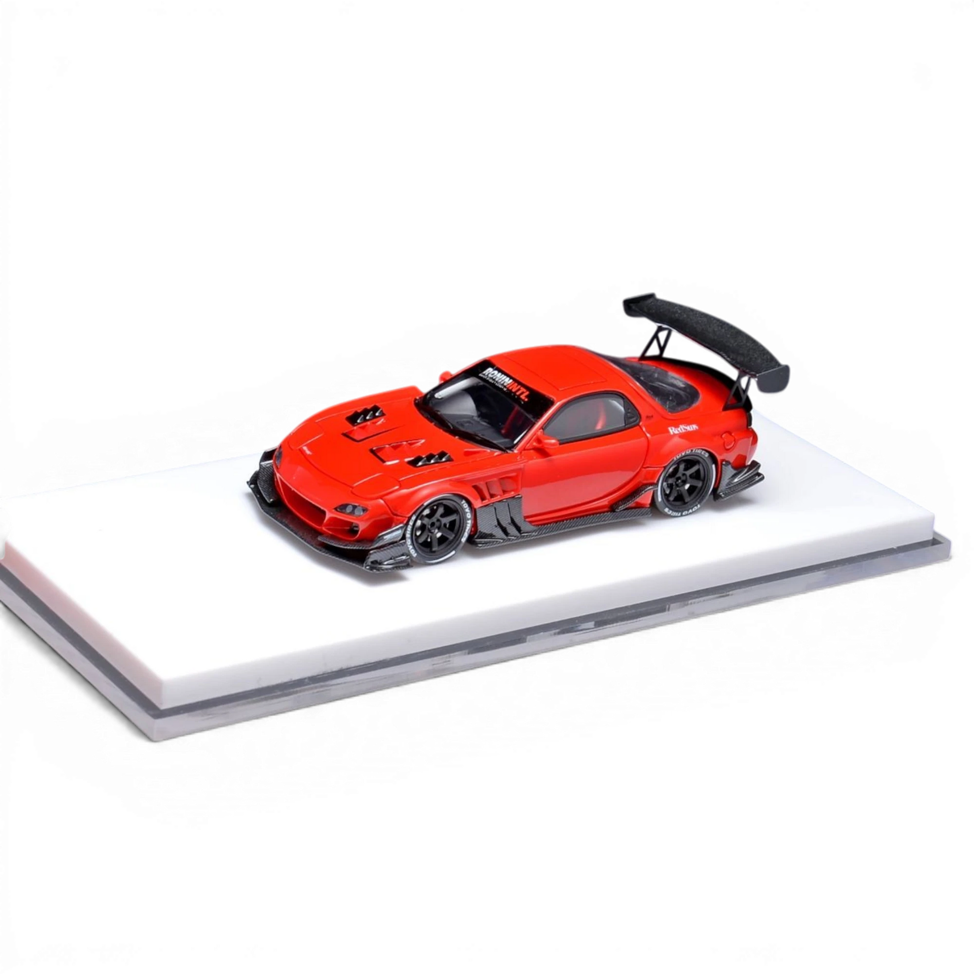 Lot57Supplies Diecast Shop red YM Model x Minicraftsman Mazda RX-7 modified 1:64 scale sealed resin model car with large rear spoiler.