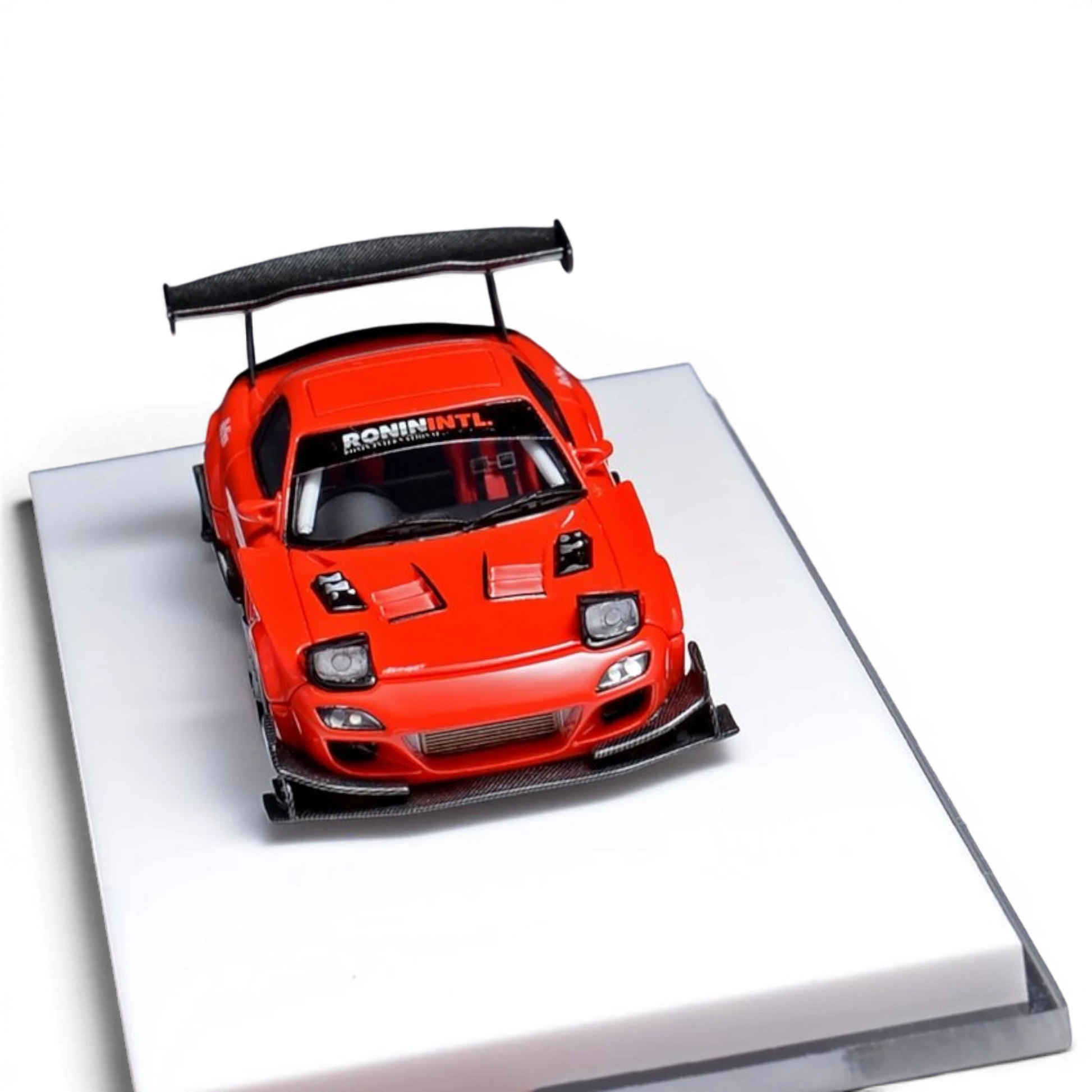 Lot57Supplies Diecast Shop 1:64 scale red Mazda RX-7 modified model car with carbon fiber wing and Ronin Intl decal