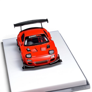 Lot57Supplies Diecast Shop 1:64 scale red Mazda RX-7 modified model car with carbon fiber wing and Ronin Intl decal