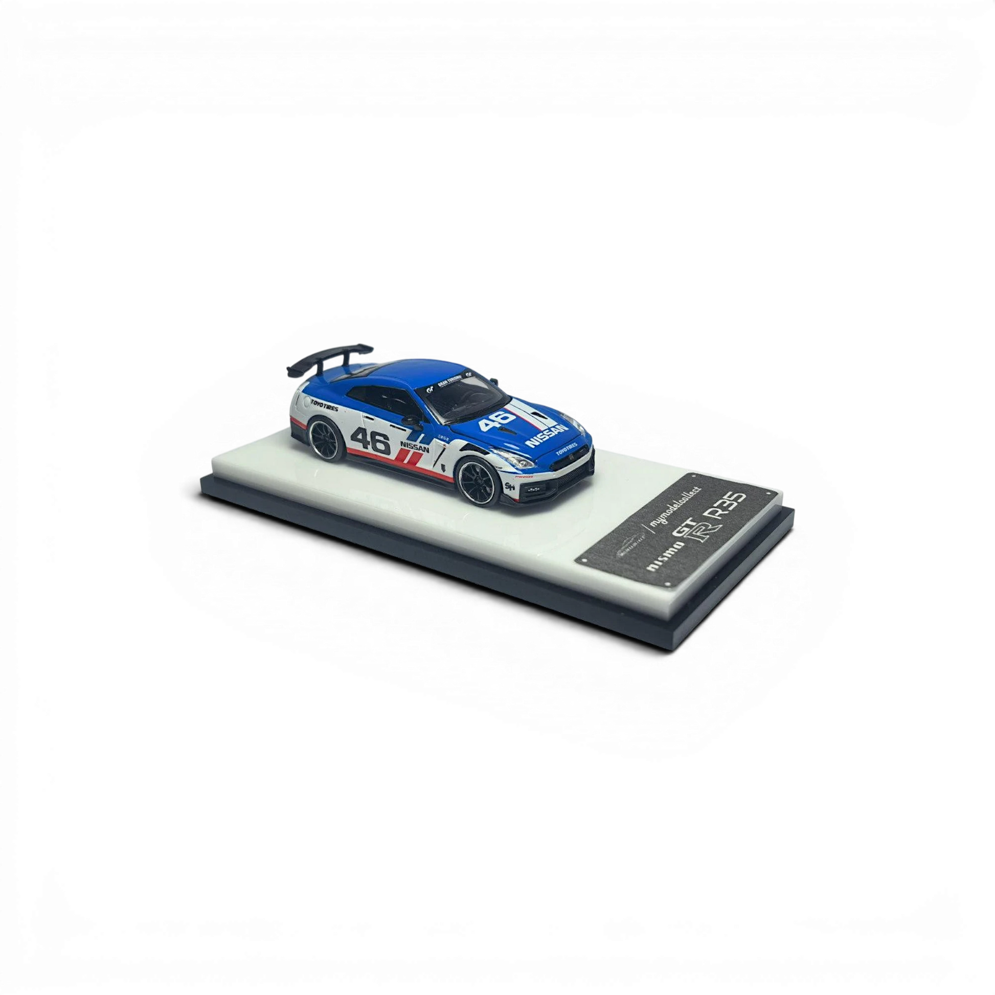 Lot57Supplies Diecast Shop 1:64 scale white and blue MC 2024 GTR R35 NISMO diecast model car with removable hood.