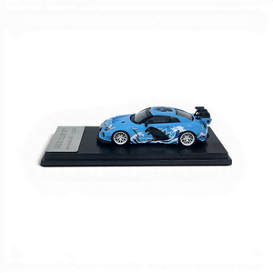 Lot57Supplies Diecast Shop 1:64 scale MC LB GTR diecast model car in blue with Godzilla wave livery on display base