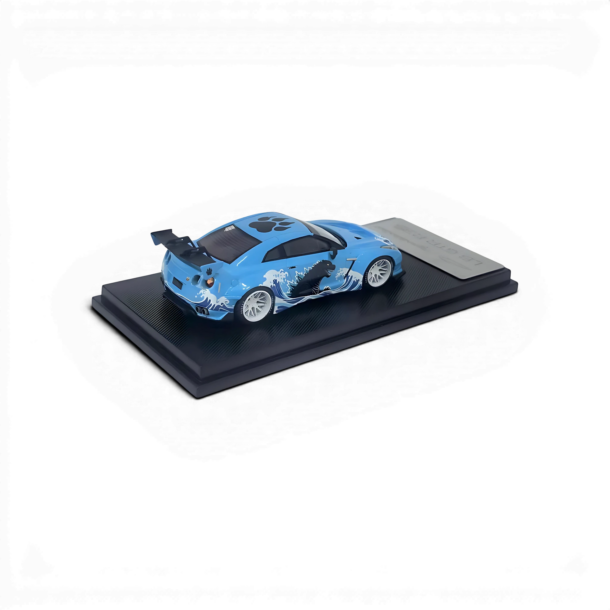 Lot57Supplies Diecast Shop 1:64 scale MC LB GTR diecast model car in blue with Godzilla wave livery and white wheels