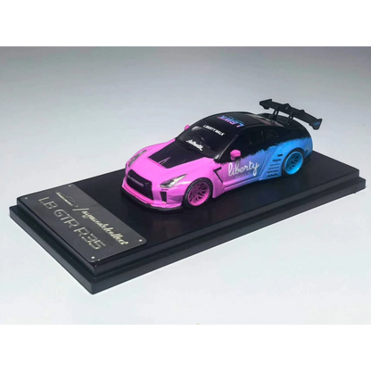 Lot57Supplies Diecast Shop 1:64 scale MC LB GTR 1.5 diecast car in flash pink and blue gradient livery on display base