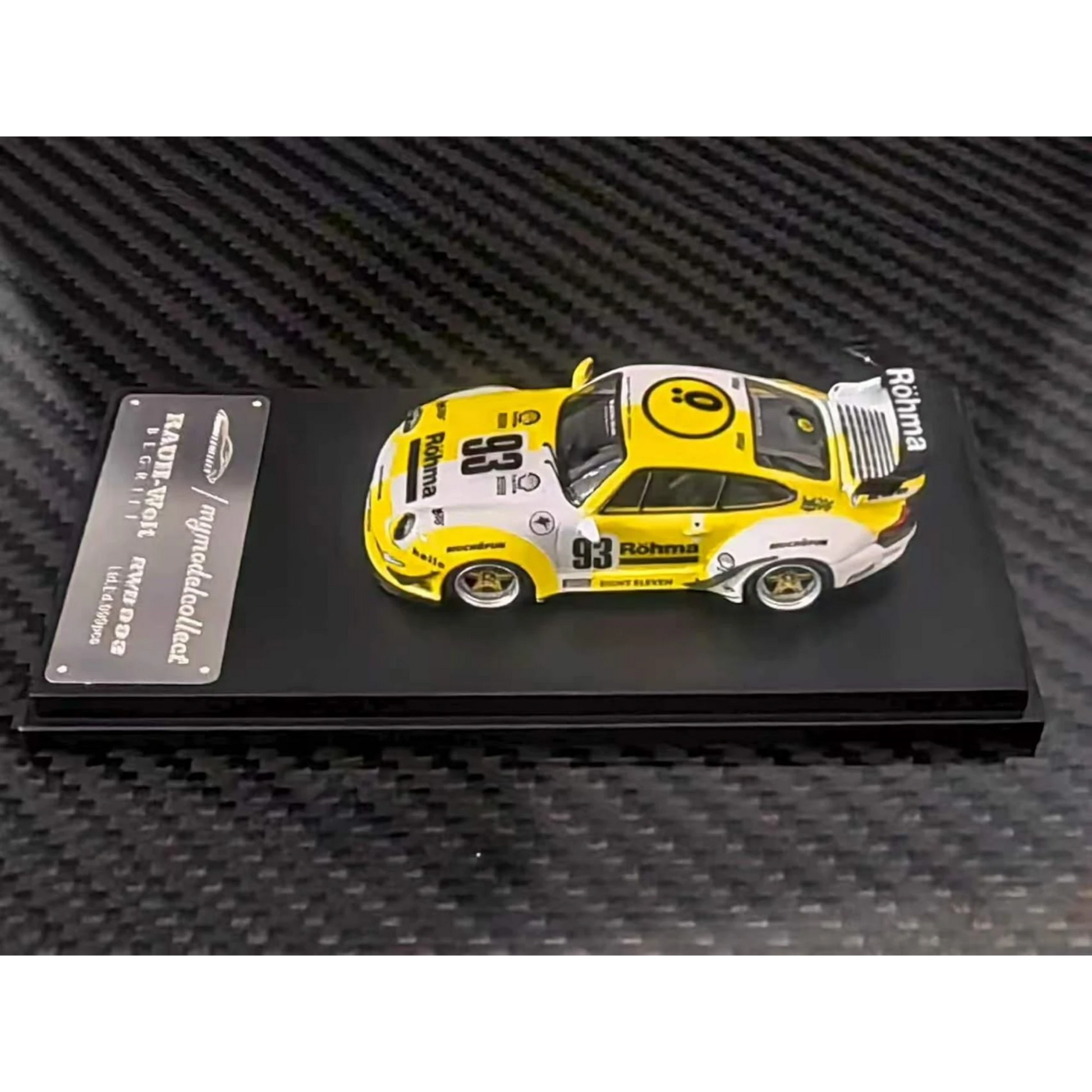 Lot57Supplies Diecast Shop MC RWB993 High Wing 1:64 scale diecast car in white and yellow Rohma livery on display base