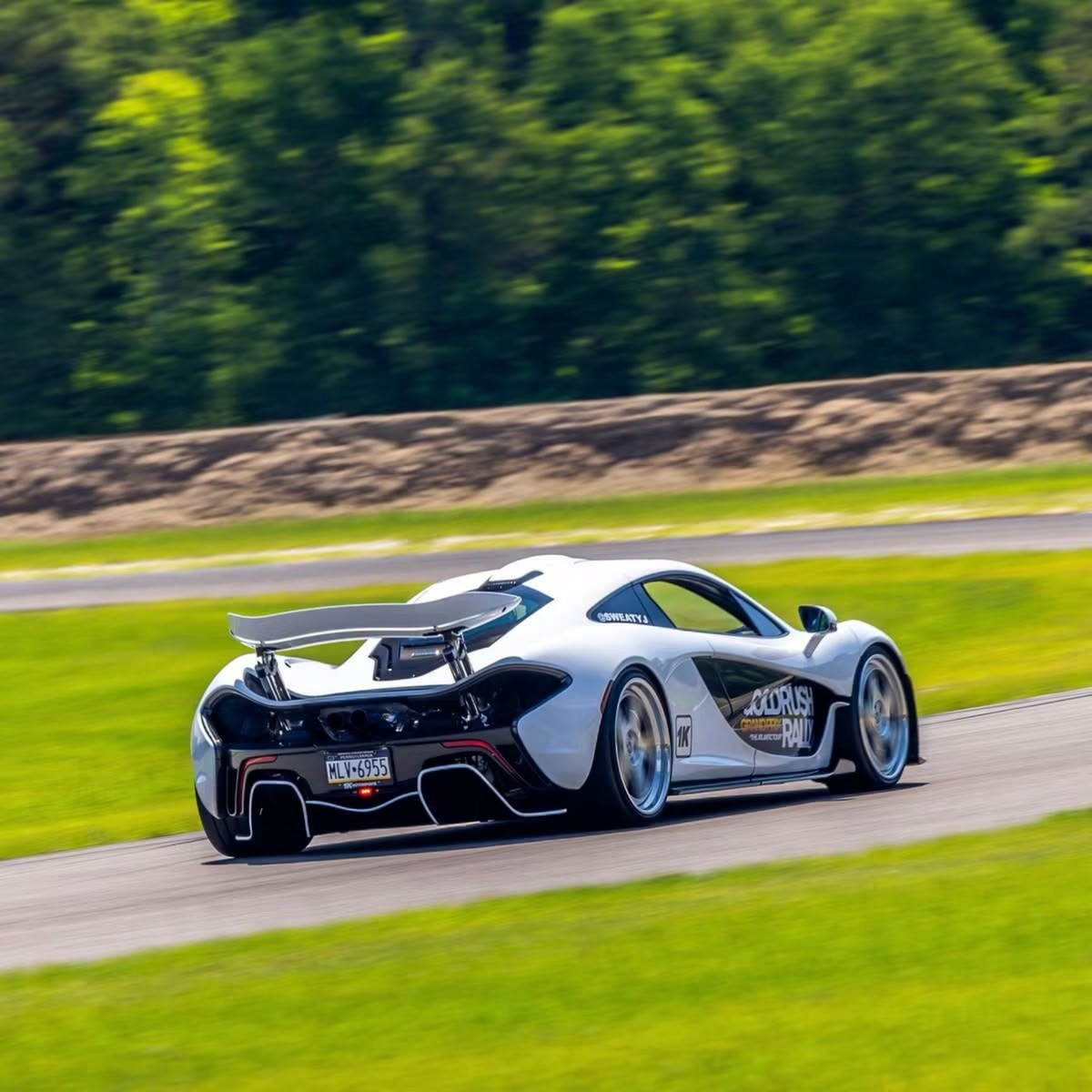 Lot57Supplies Diecast Shop Halo x EDM McLaren P1 Gold Rush Rally 1:64 scale white resin model car on a race track
