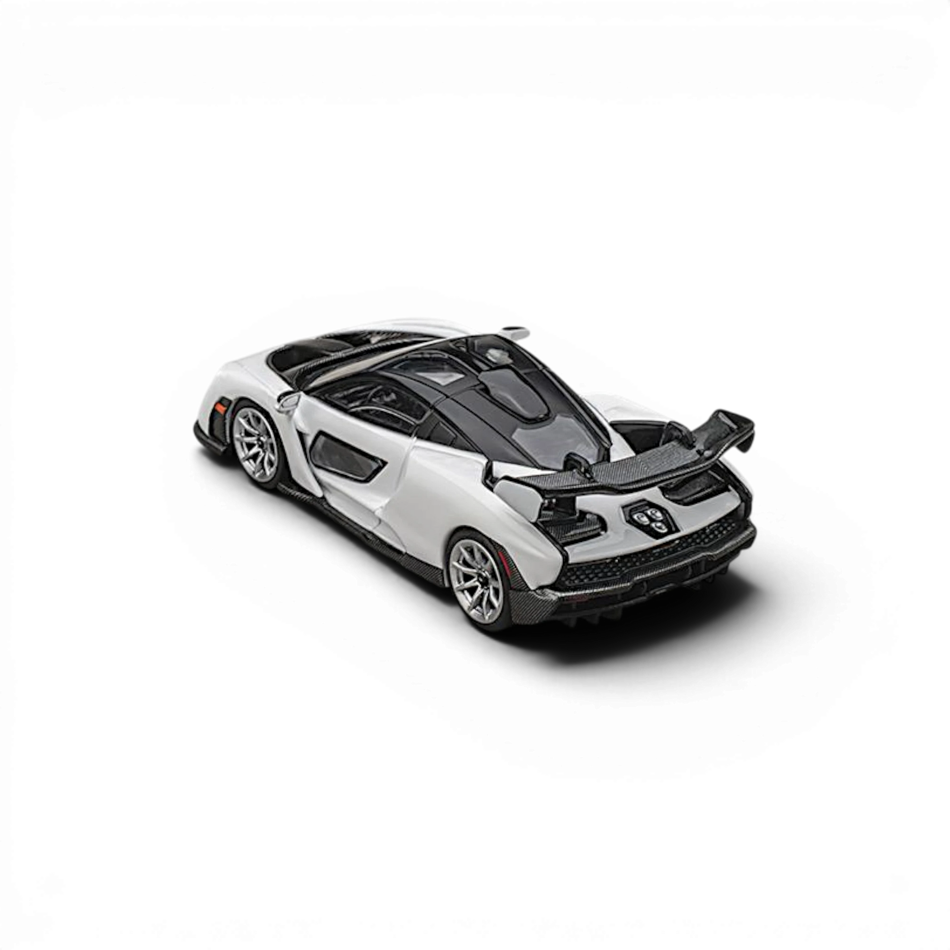 Lot57Supplies Diecast Shop 1:64 scale CM Model McLaren Senna in Silica White with detailed carbon fiber rear wing.