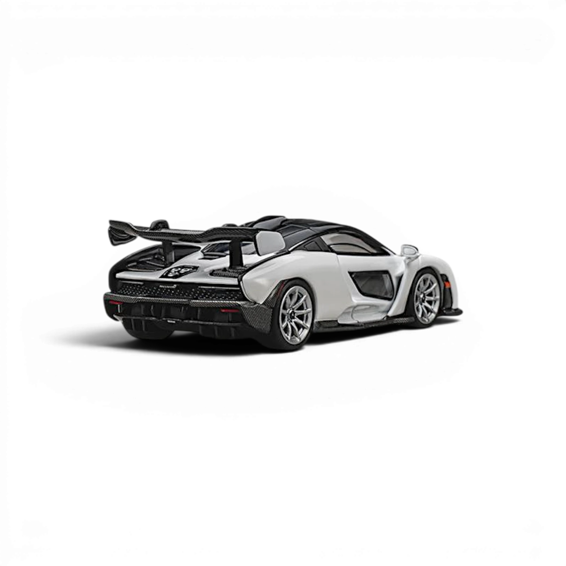 Lot57Supplies Diecast Shop 1:64 scale CM Model McLaren Senna in Silica White with carbon fiber rear wing details.