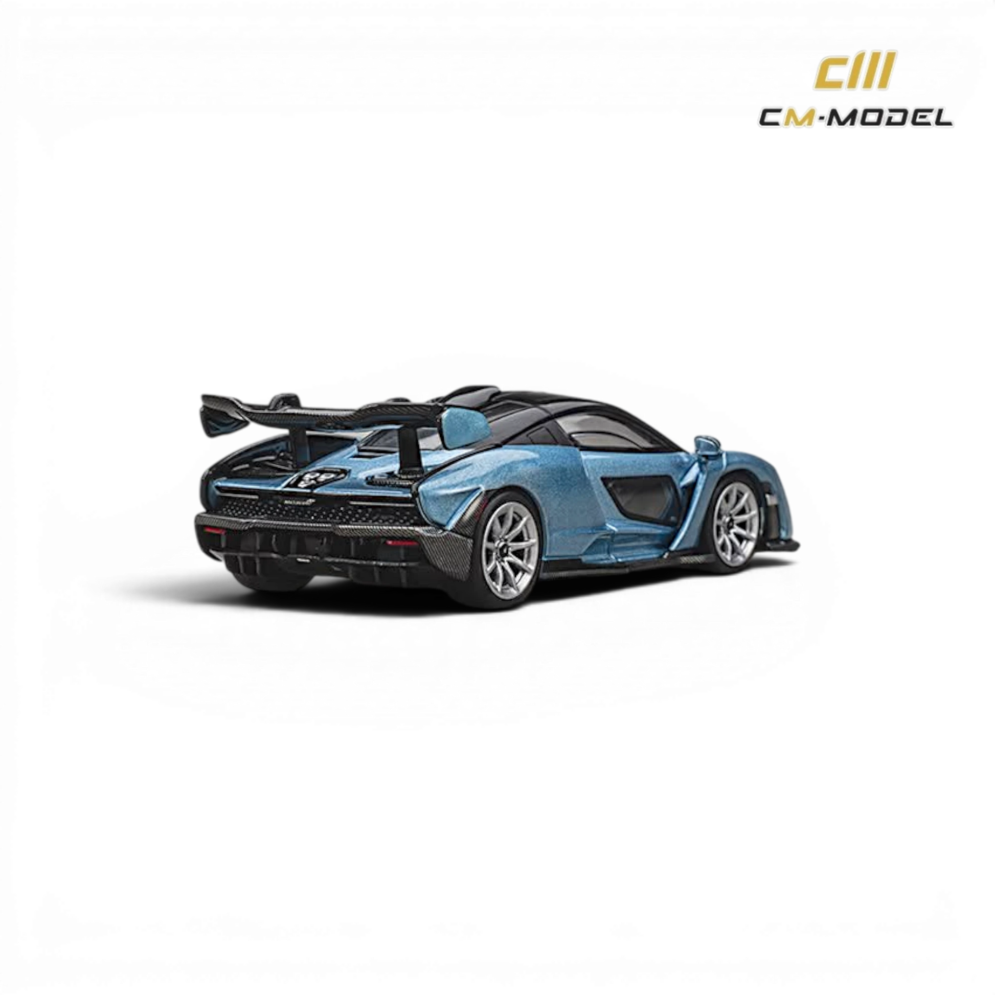 Lot57Supplies Diecast Shop CM Model 1:64 scale McLaren Senna diecast car in ice blue with carbon fiber details