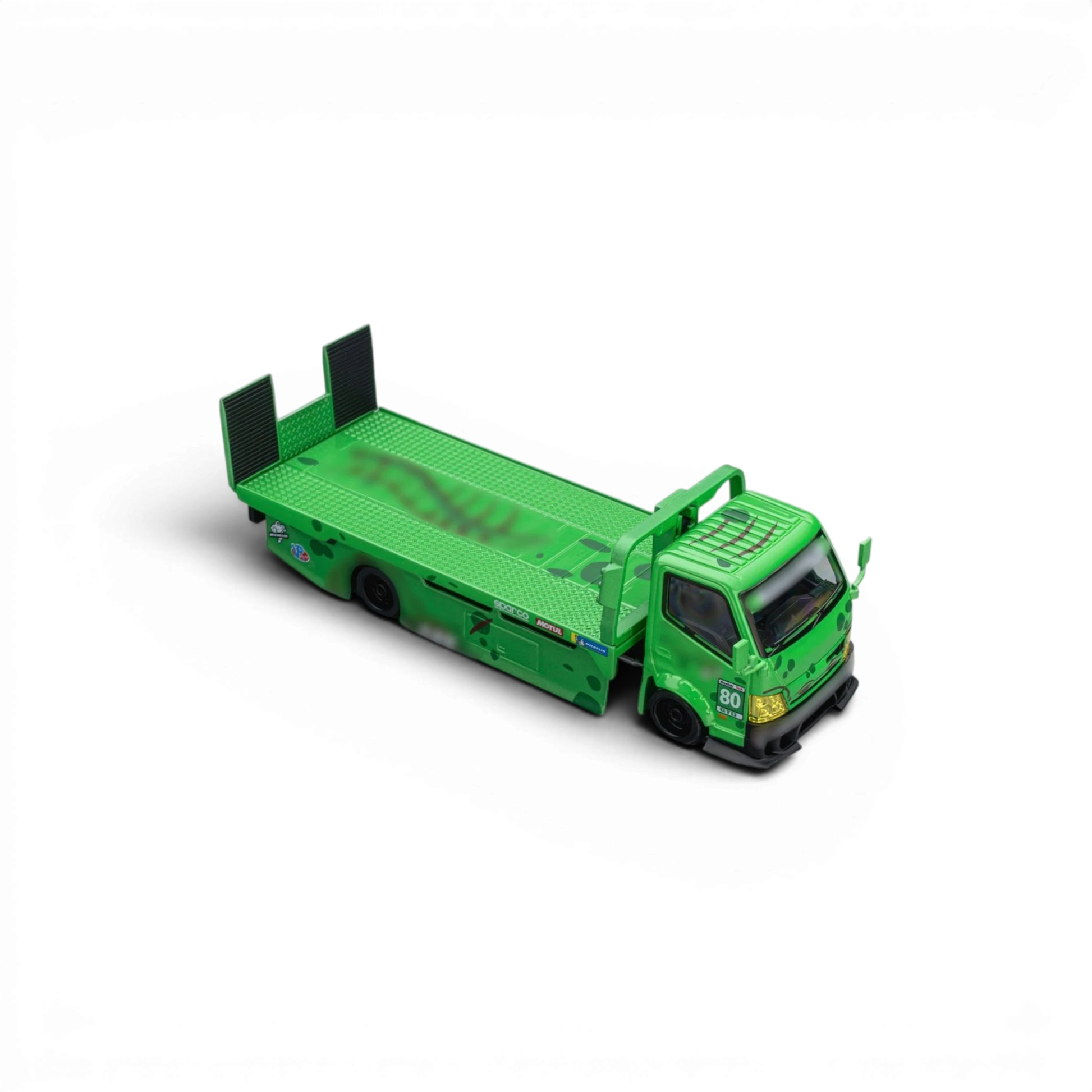 Lot57Supplies Diecast Shop Mega Gear Custom Hauler 1:64 scale diecast truck in green dino print with racing decals.