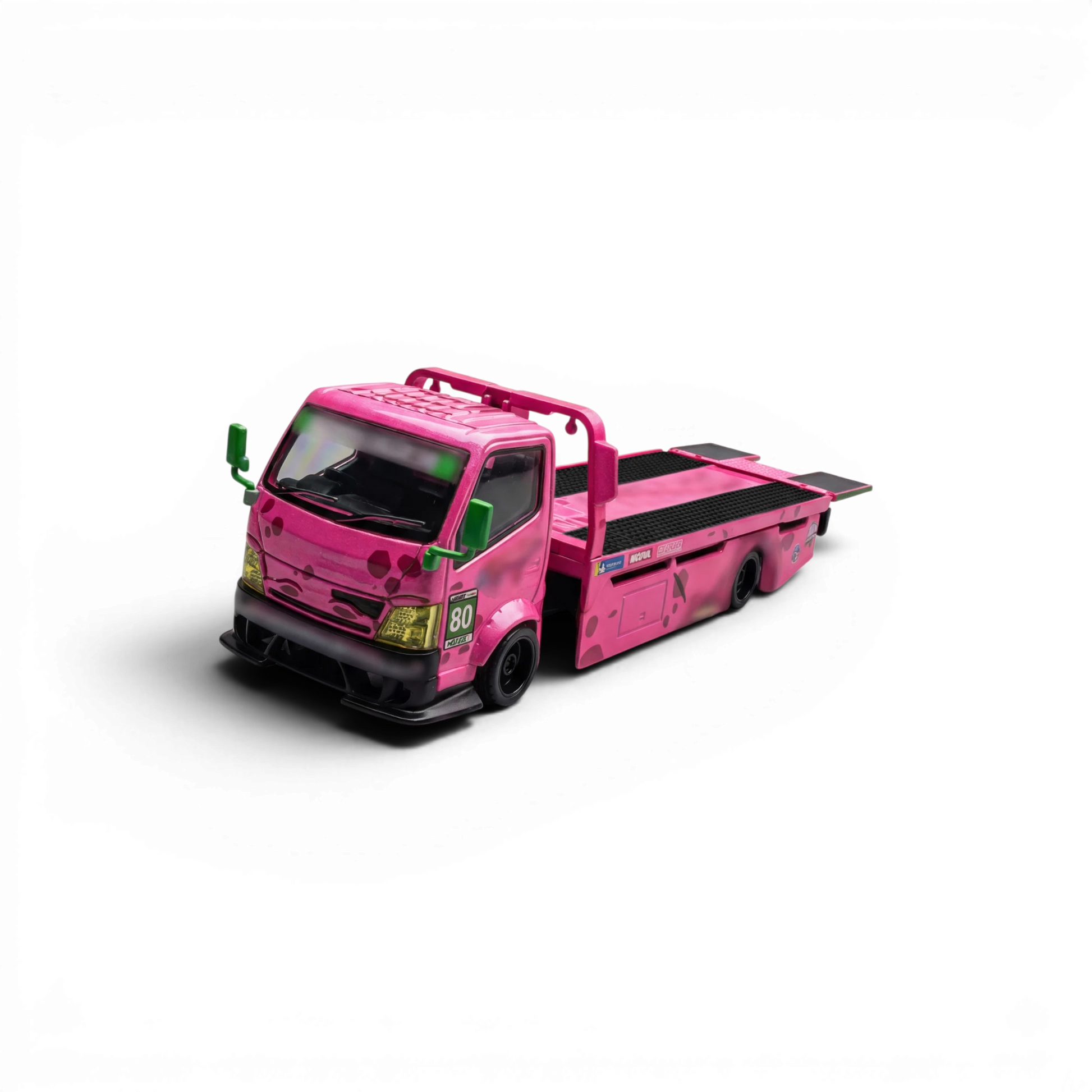 Lot57Supplies Diecast Shop Mega Gear Custom Hauler 1:64 scale diecast truck in pink dino theme with green accents.
