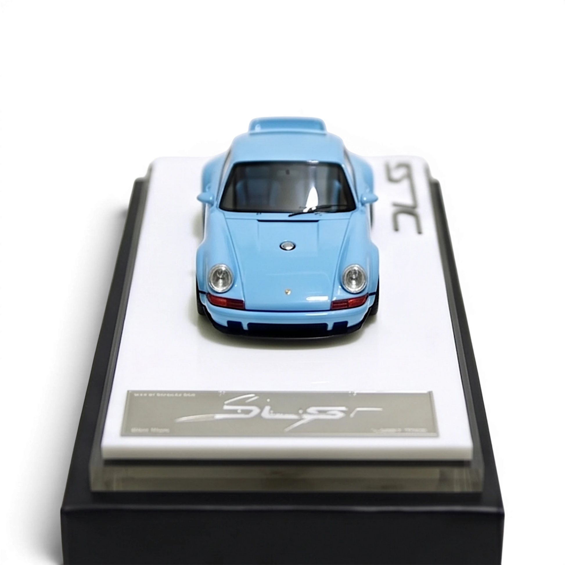 Lot57Supplies Diecast Shop Meissen Blue 1:64 scale resin model of the DeepMaker Singer DLS on a display base.