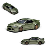 Lot57Supplies Diecast Shop Millennium Jade Nissan Skyline GT-R R34 Smilodon 1:64 scale diecast model with aggressive aero.
