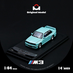 Lot57Supplies Diecast Shop 1:64 scale mint green BMW E30 M3 diecast model car on a black display base