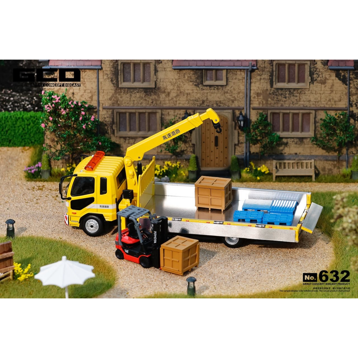 Lot57Supplies Diecast Shop 1:64 scale yellow Mitsubishi Fuso crane truck with forklift and wooden crates in diorama