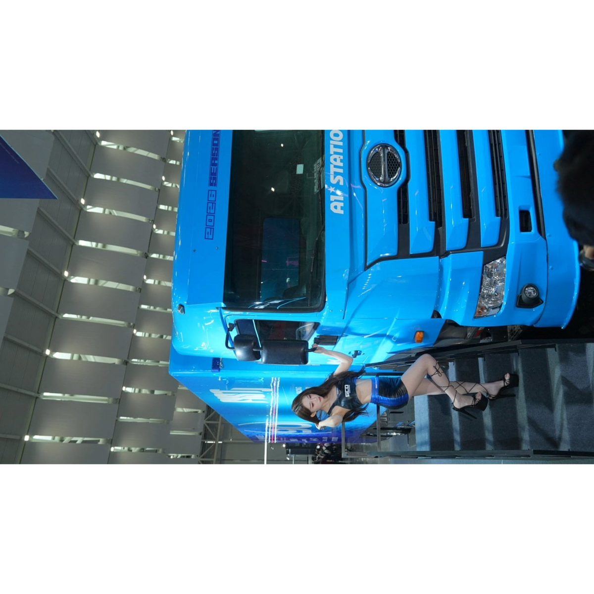 Lot57Supplies Diecast Shop model of a blue Mitsubishi Fuso Super Great truck with FIST livery and a promotional model