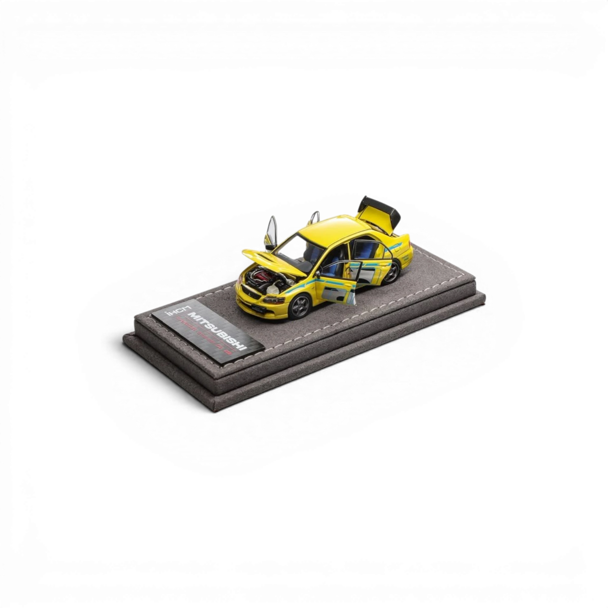 Lot57Supplies Diecast Shop yellow IHCM Mitsubishi Lancer Evolution IX GSR 1:64 scale model with 6 opening doors