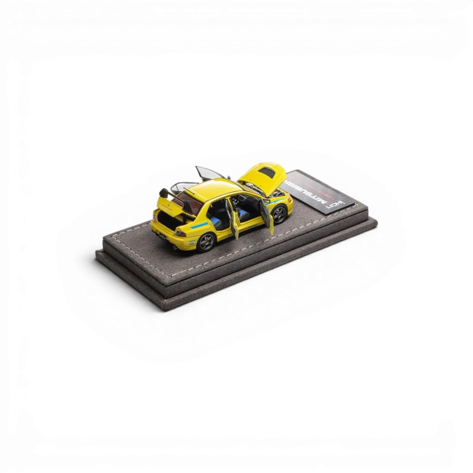 Lot57Supplies Diecast Shop yellow IHCM Mitsubishi Lancer Evolution IX GSR 1:64 scale model with 6 opening doors