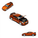 Lot57Supplies Diecast Shop MOTORHELIX 1:64 scale diecast Nissan GT-R R35 in sunset orange with white wheels.