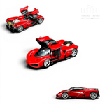 Lot57Supplies Diecast Shop MotorHelix Nilu 1:64 scale red die-cast model car with gull-wing doors open and visible V12 engine.