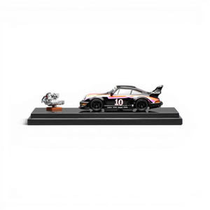 Lot57Supplies Diecast Shop MotorHelix RWB 964 #10 1:64 scale model car with engine replica. Black with orange and purple accents.