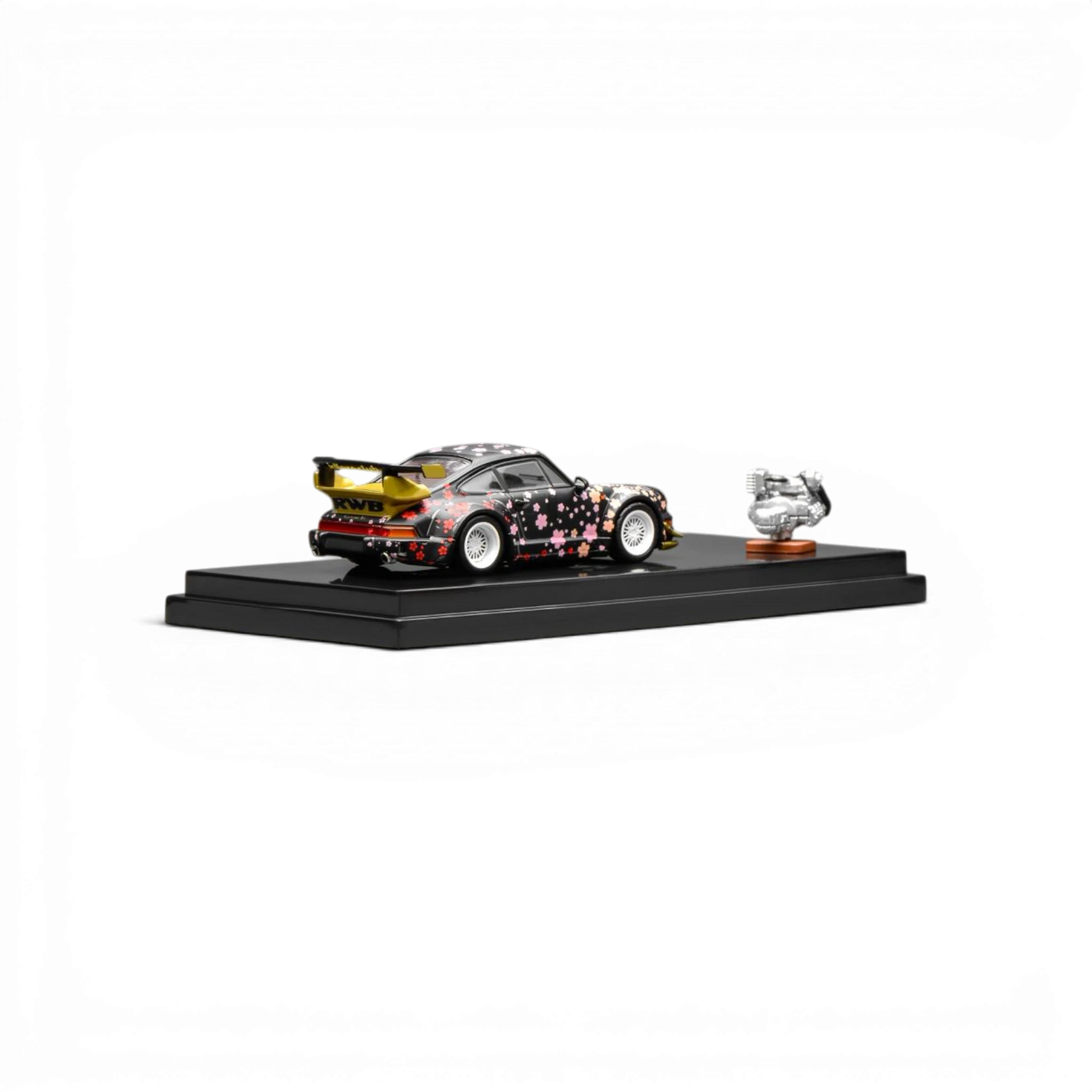 Lot57Supplies Diecast Shop MotorHelix RWB 964 Aoki Sakura 1:64 scale diecast model car with cherry blossom graphics and a separate engine replica.