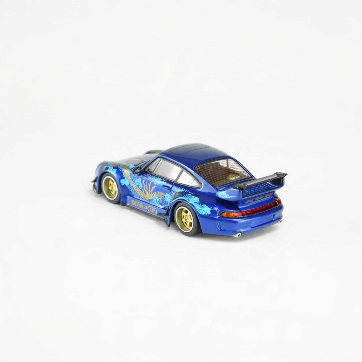 Lot57Supplies Diecast Shop MOTORHELIX RWB 993 diecast car in Royal Ocean blue with gold wheels and dragon graphics