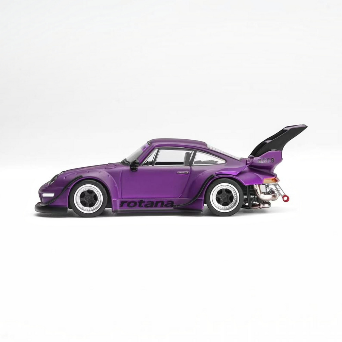 Lot57Supplies Diecast Shop MotorHelix RWB 993 Rotana diecast model car in matte purple with large rear wing