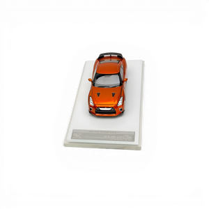 Lot57Supplies Diecast Shop 1:64 scale Motorhelix Nissan GT-R R35 2021 diecast model car in metallic sunset orange.