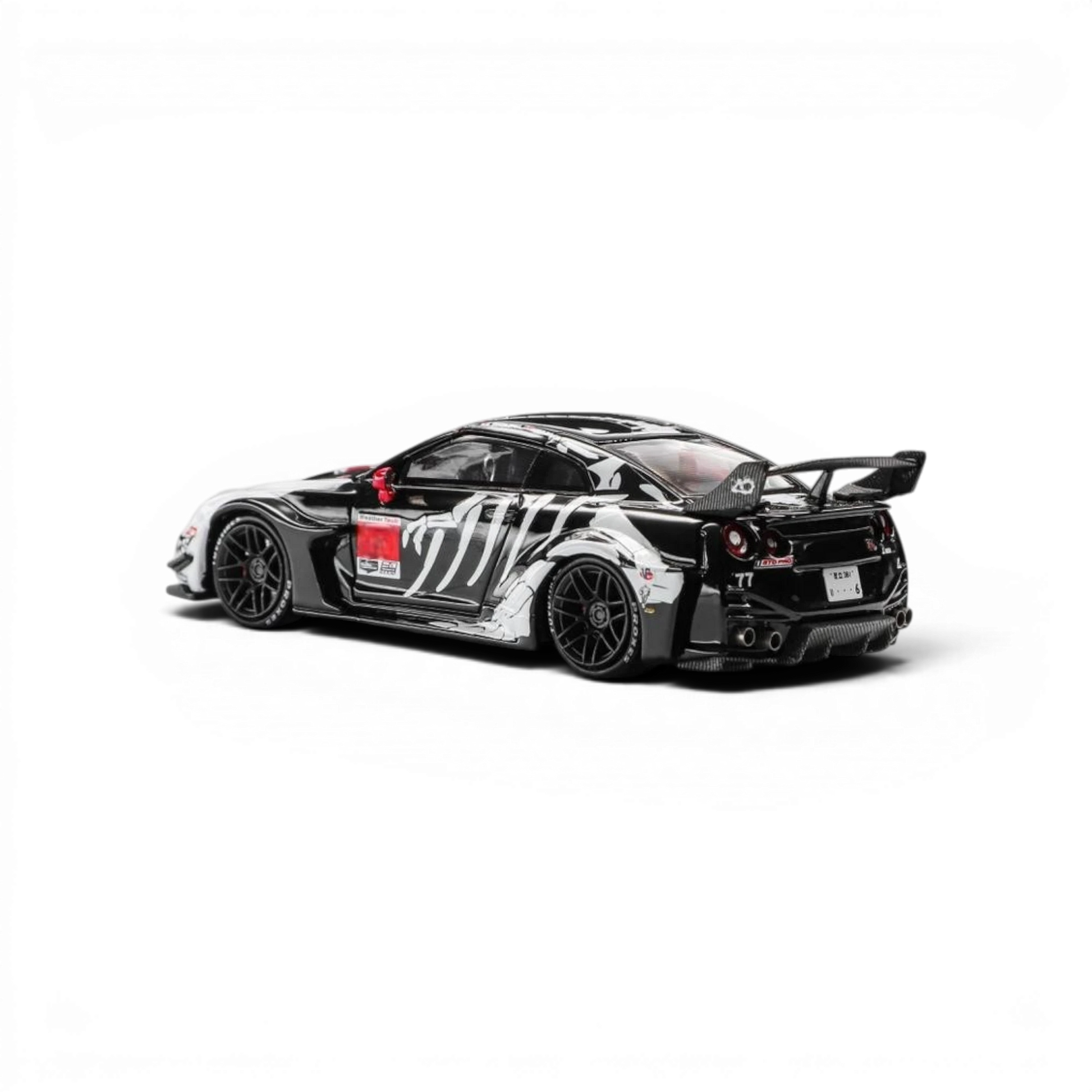 Lot57Supplies Diecast Shop 1:64 scale black and white Bone Dragon Livery Nissan GTR35 RR resin model car with openable hood.