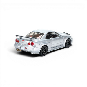Lot57Supplies Diecast Shop silver 1:64 scale Street Weapon Nissan R34 GT-R diecast model with front snow lights.