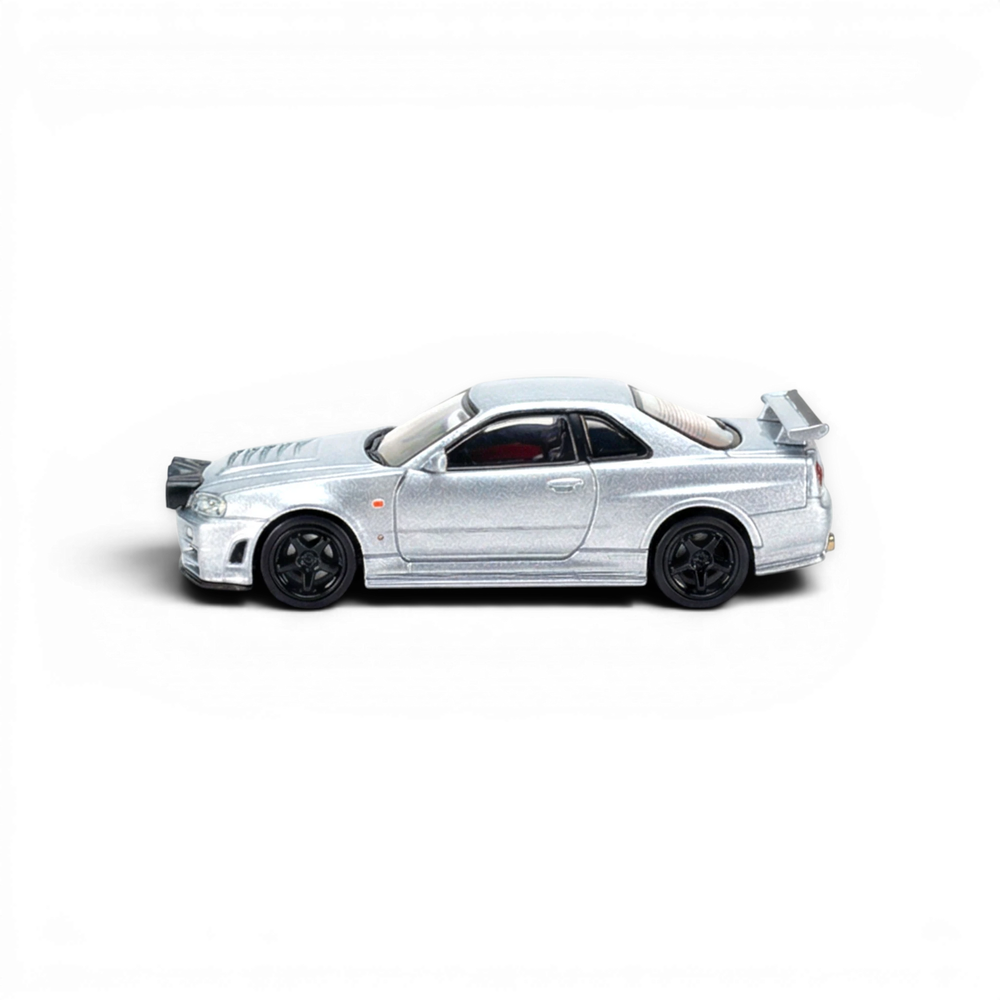 Lot57Supplies Diecast Shop silver Street Weapon Nissan R34 GT-R 1:64 scale diecast model with front snow lights.