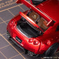 Lot57Supplies Diecast Shop PGM Nissan R35 widebody diecast car in metallic red with open trunk, 1:64 scale model.
