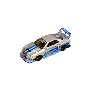 Nitro Blaze 1:64 scale diecast Nissan Skyline ER34 LB-Super Silhouette in silver with blue racing stripes and decals.