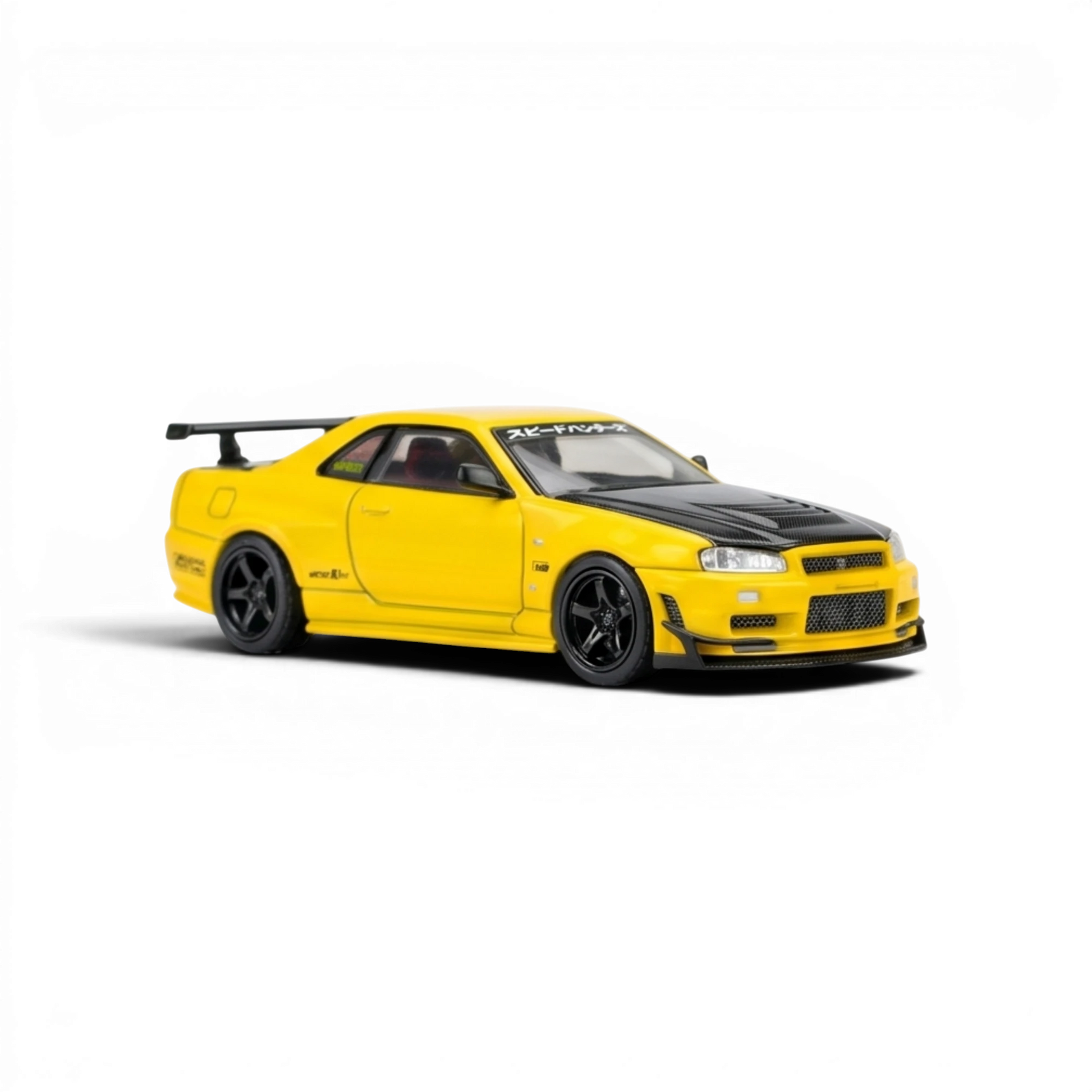 Lot57Supplies Diecast Shop: MOTORHELIX 1:64 scale yellow Nissan Skyline GT-R R34 with GT aero kit and carbon fiber hood.