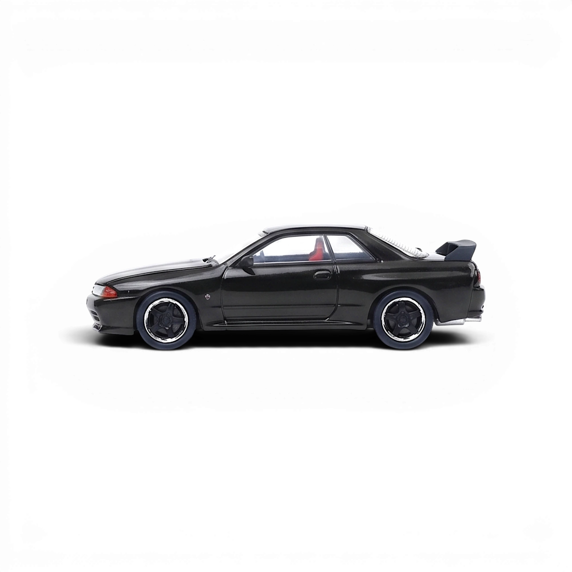 Cool ART Nissan Skyline GT-R R32 diecast model from Lot57Supplies Diecast Shop with black rims and openable hood.