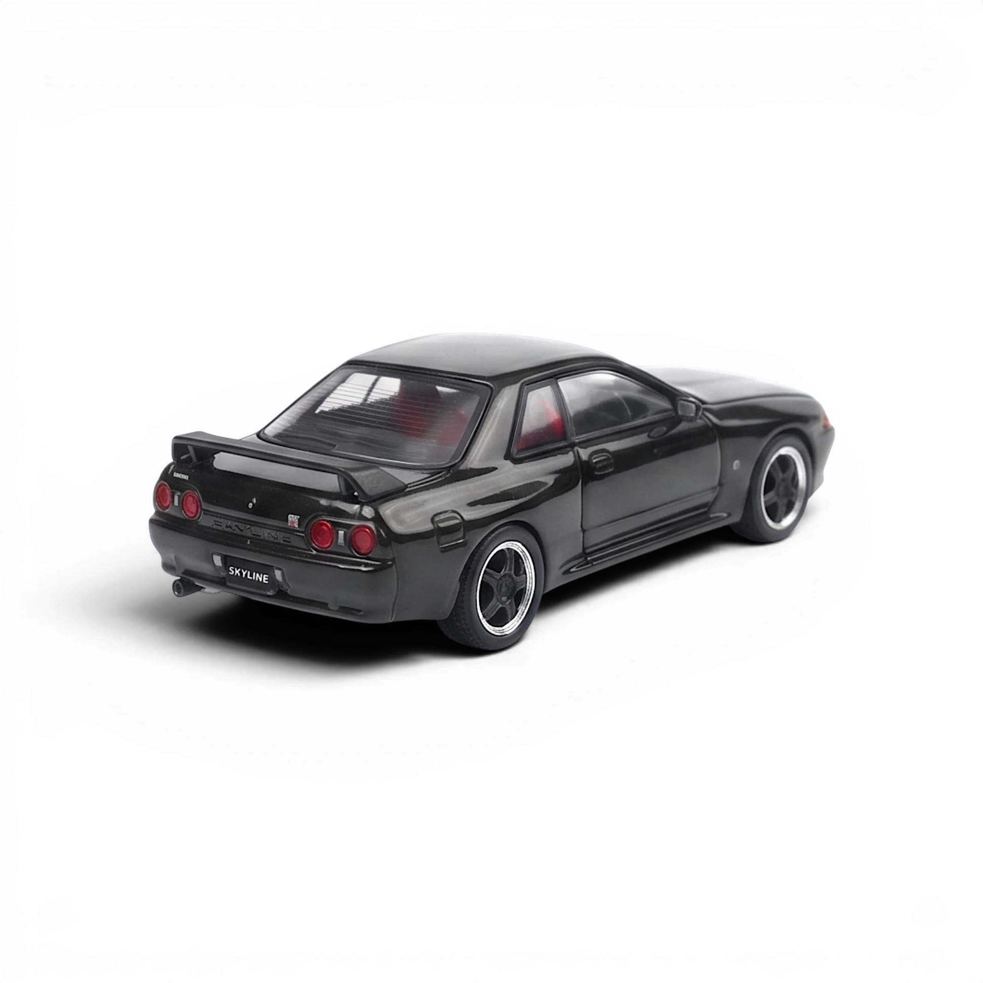 Cool ART Nissan Skyline GT-R R32 1:64 diecast model from Lot57Supplies Diecast Shop with black rims and rear detail.