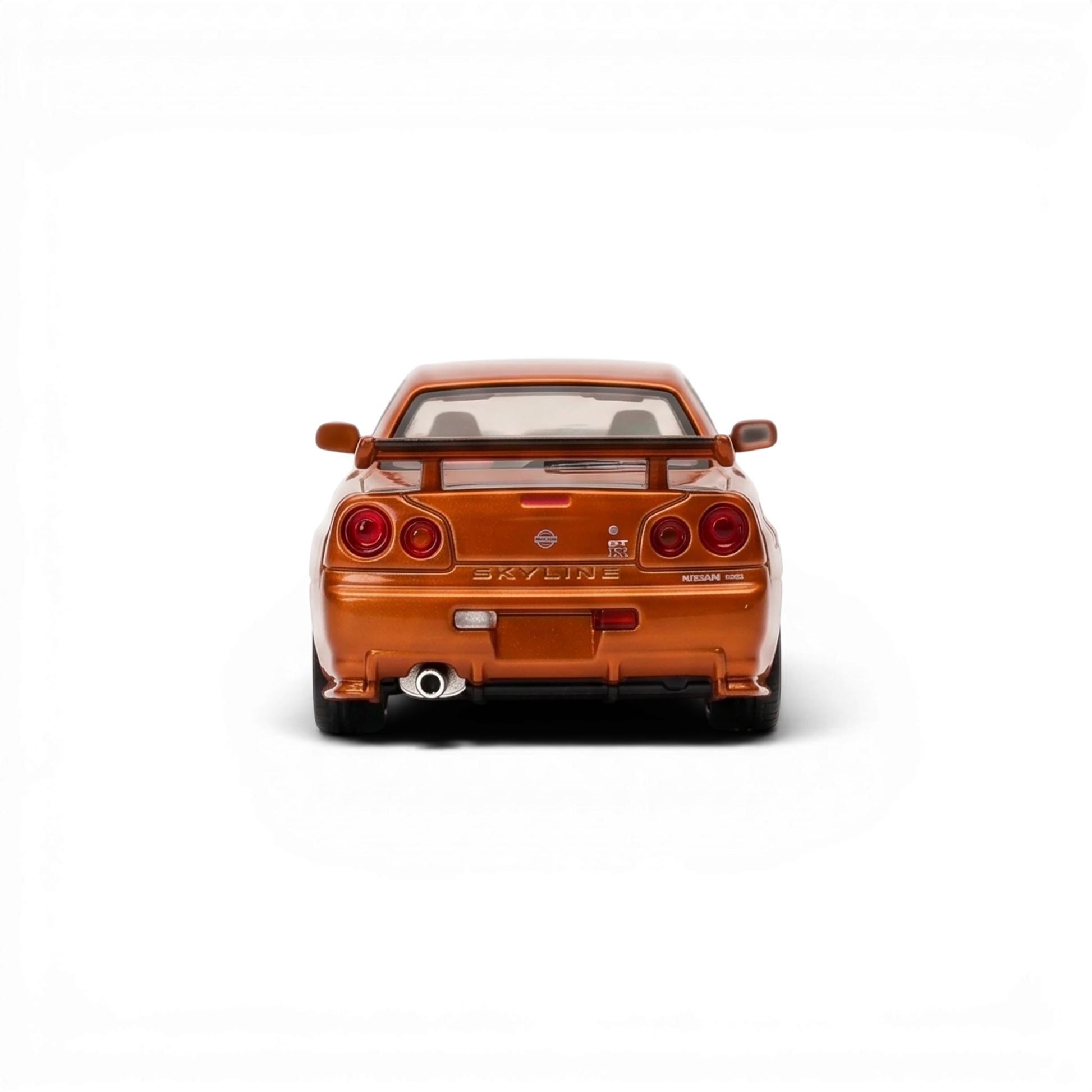 Lot57Supplies Diecast Shop 1:64 scale metallic orange Nissan Skyline GT-R R34 diecast model car, rear view