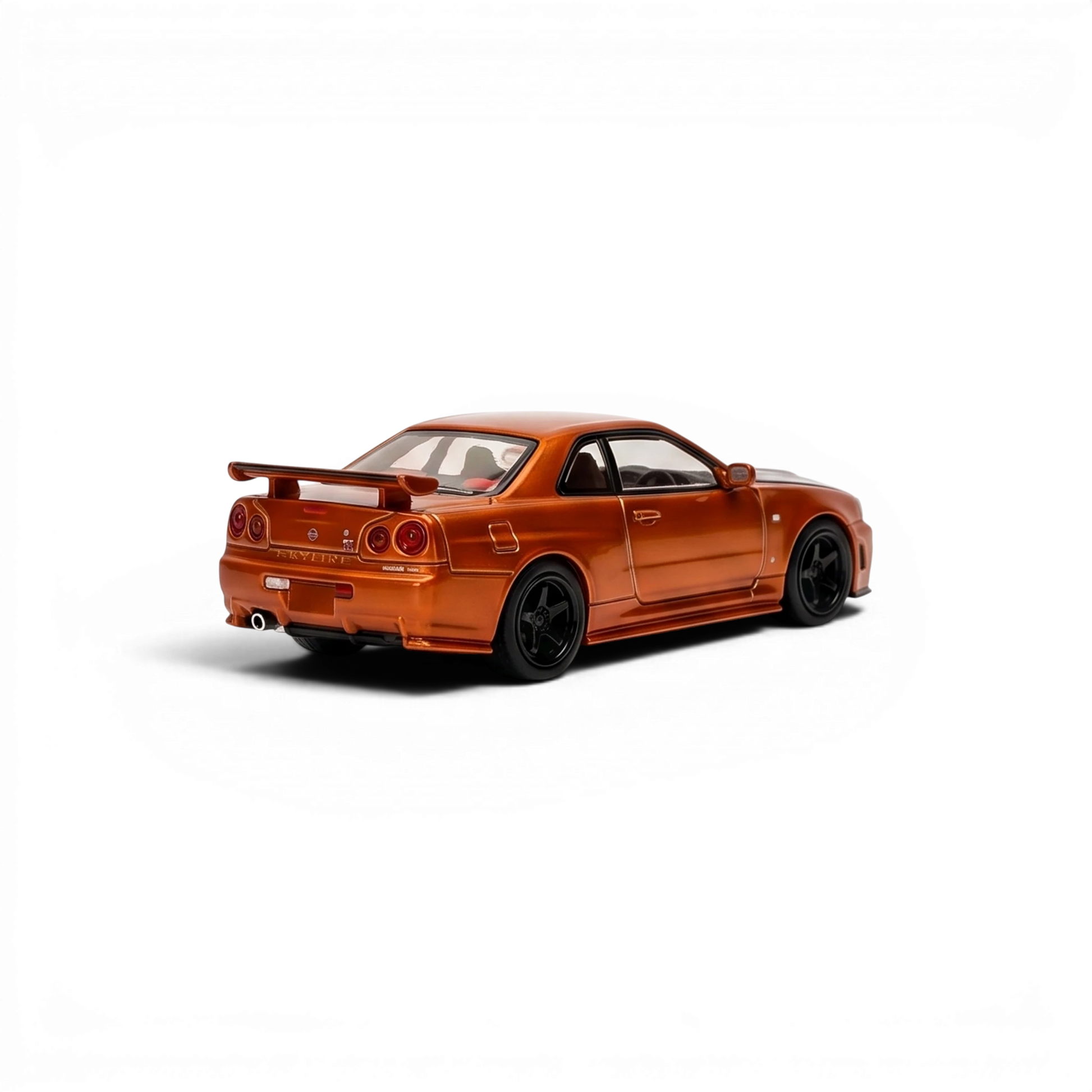 Lot57Supplies Diecast Shop MOTORHELIX 1:64 scale metallic orange Nissan Skyline GT-R R34 diecast model car rear view