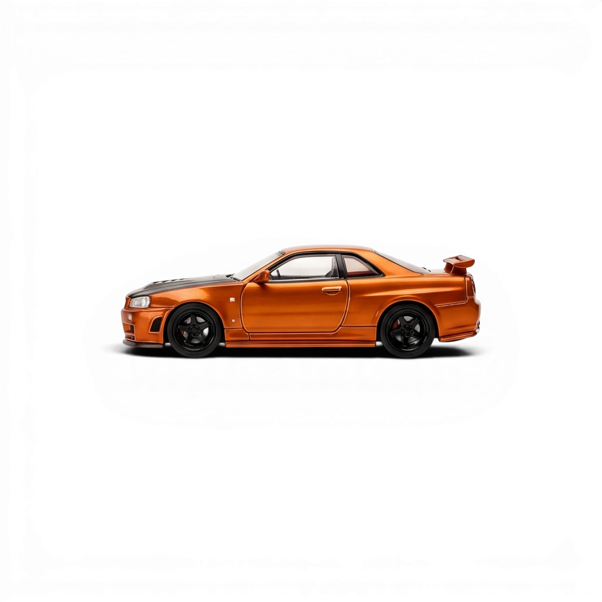 Lot57Supplies Diecast Shop MOTORHELIX 1:64 scale metallic orange Nissan Skyline GTR R34 diecast model car side view