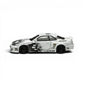 Lot57Supplies Diecast Shop 1:64 scale white Nissan Skyline R34 GT-R model with black flame graphics and racing decals.