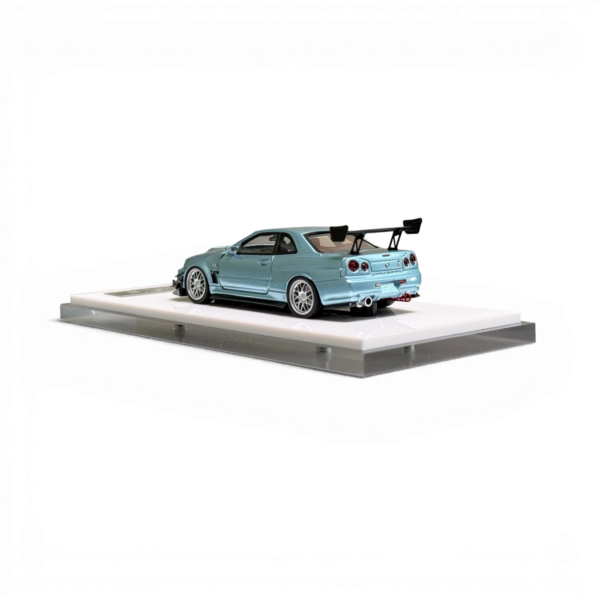404ERROR Nissan Skyline R34 modified diecast car in ice blue from Lot57Supplies Diecast Shop, 1:64 scale model.