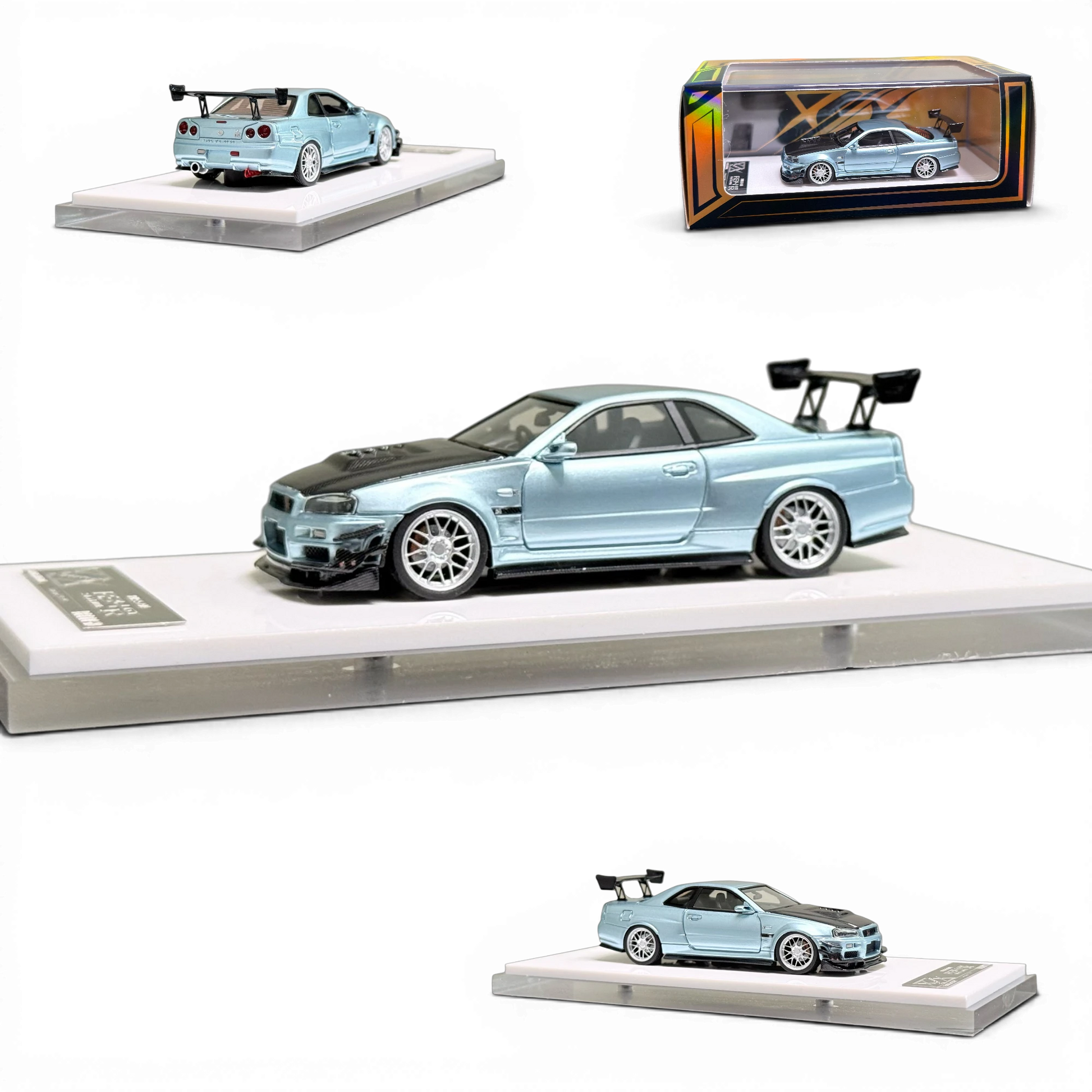 Lot57Supplies Diecast Shop 404ERROR 1:64 Nissan Skyline R34 in ice blue with carbon hood and rear wing on display base