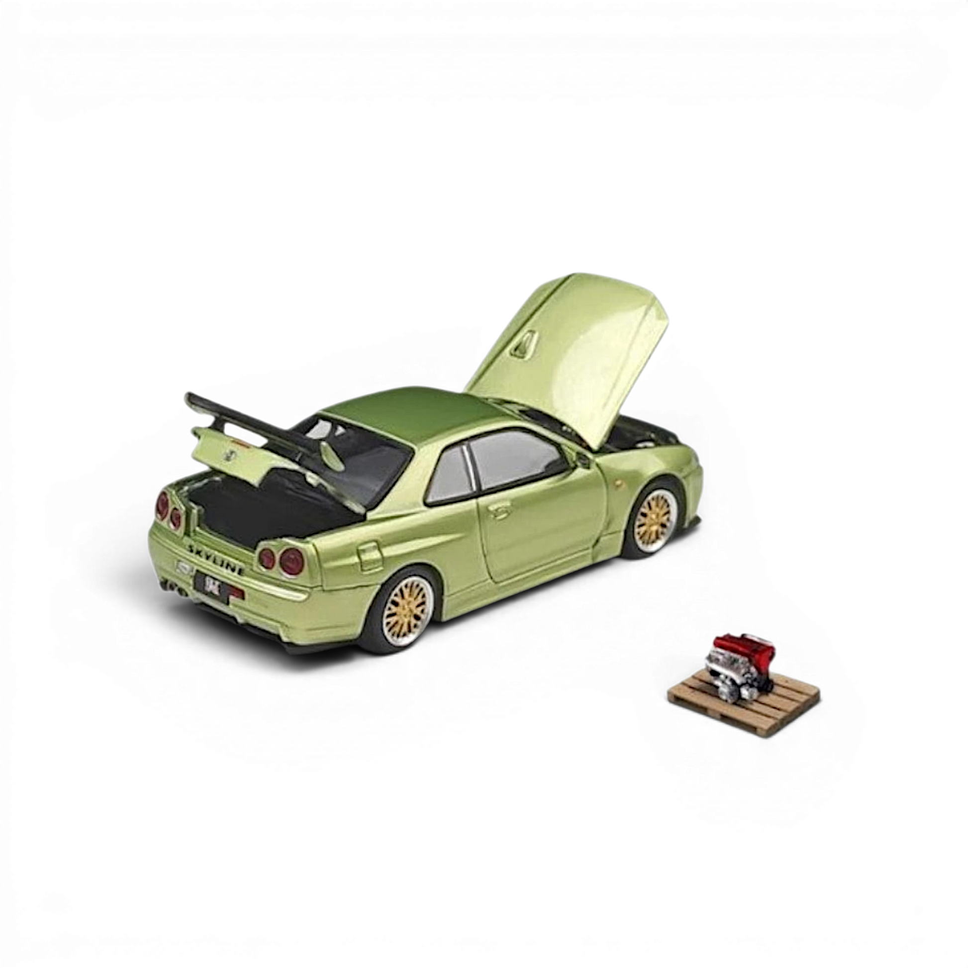 Lot57Supplies Diecast Shop Cool ART 1:64 scale jade green Nissan Skyline GT-R R34 diecast model with openable parts
